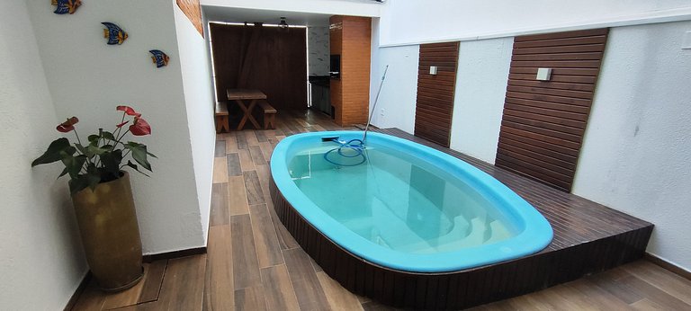 Casa ampla com lazer e praia próxima para famílias