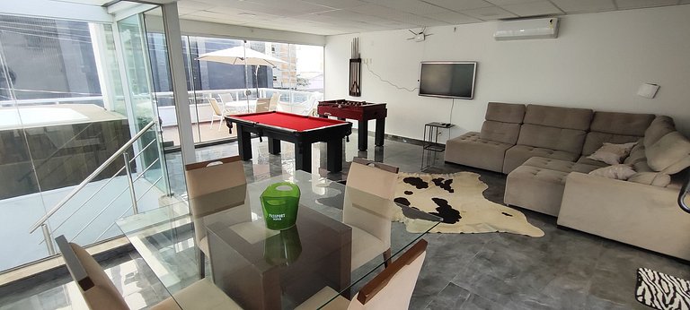 Casa ampla com lazer e praia próxima para famílias