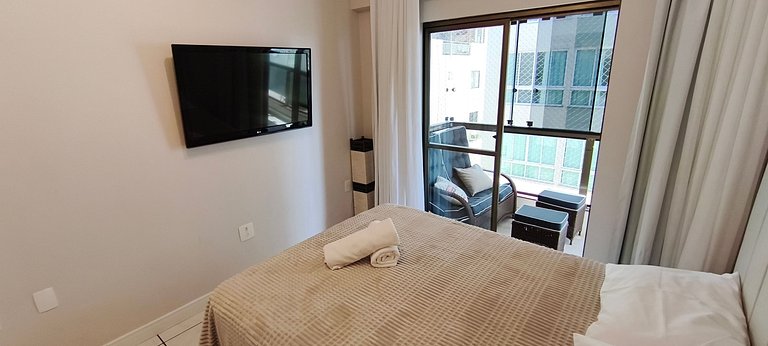 Conforto em frente ao mar, sacada e churrasqueira